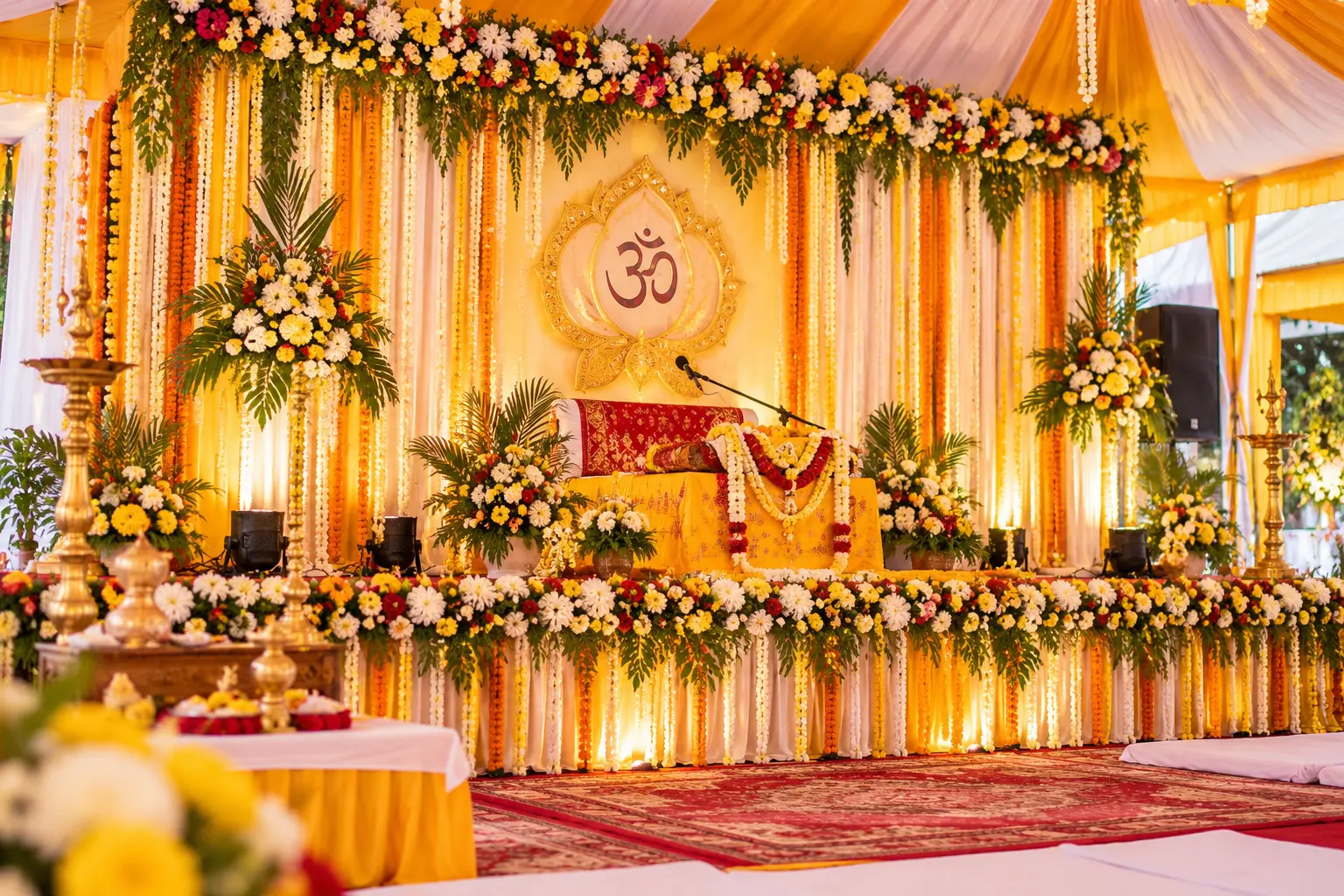 Vyas Peeth stage decoration setup with traditional floral styling and backdrop
